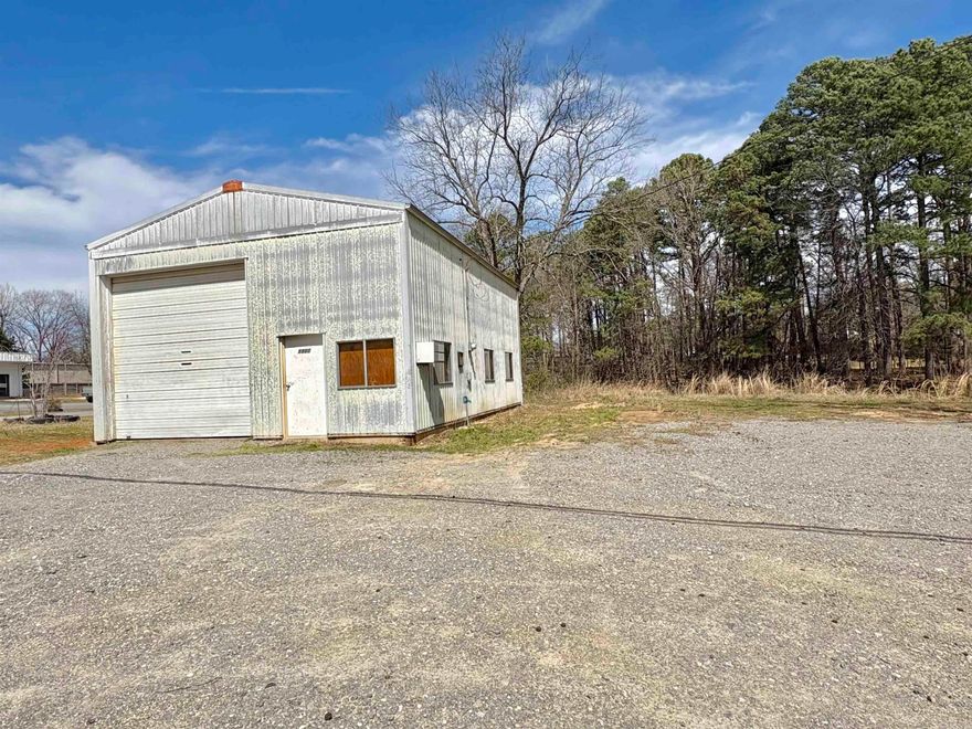 Great location for your business! Shop has a 4 post drive on lift with jack system, bathroom & front lobby area. There are LED lights and it is wired for an air compressor as well. Land layout gives you room to grow if needed. If the lift is not needed by the buyer, make an offer without it. The location/ shop is ready for your new business venture!