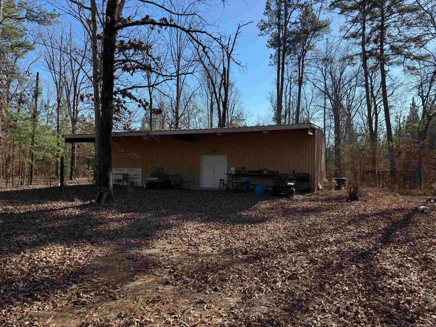 Great hunting property with cabin and 16 acres of timberland, metal shop cabin with 2,000 sq ft of space, offers 2 bedrooms and 1 bath, CH/CA, well water and electricity.