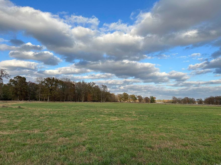 The Hwy. 64 Hobby Farm is has an access point off of Hwy. 64 just west of Beebe and near El Paso. This farm is fenced on all sides and has a gate off of Hwy. 64. This is an outstanding location for your small farm with roughly 3 acres of mature hardwoods and the balance being in pasture. There's an old roadbed that takes you to the patch of hardwood trees located on the north side of the property providing a beautiful building location. Whitetail deer are seen just about every evening on the north side of the property bordering the timber.  County water and electric are convenient to the property also. This property is less than 10 minutes from Beebe and less than 15 minutes from Cabot. Also, it's 10 minutes from Hwy. 67/167, and 3 minutes from Hwy. 5. (Additional acreage is available. Agent owned.)   -9 miles to Beebe. -15 miles to Cabot. -20 miles to Conway. -25 miles to North Little Rock. -25 miles to Searcy.