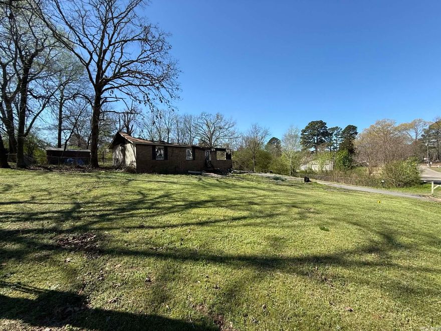 Located in Benton, Arkansas, this 0.46-acre subdivision lot offers a great opportunity to build a new home in an established neighborhood. Previously the site of a residence, this property provides a spacious homesite with room to design and build to your needs. The nearly half-acre lot allows space for a yard, outdoor living areas, or additional parking while still enjoying the convenience of subdivision living.  Situated just minutes from downtown Benton, Interstate 30, shopping, dining, and local schools, the location provides an easy commute to Little Rock and surrounding areas while maintaining the charm of a quiet residential setting.  Whether you are looking to build your primary residence, invest in land, or create a custom home, this Benton lot offers excellent potential in a desirable Saline County location.  Don’t miss the chance to secure a buildable lot in Benton, AR with convenient access to everything the area has to offer.  **Previous home lost to fire and burned structure remains on the property. Property is being sold as-is, where-is, with no repairs to be made by the seller.