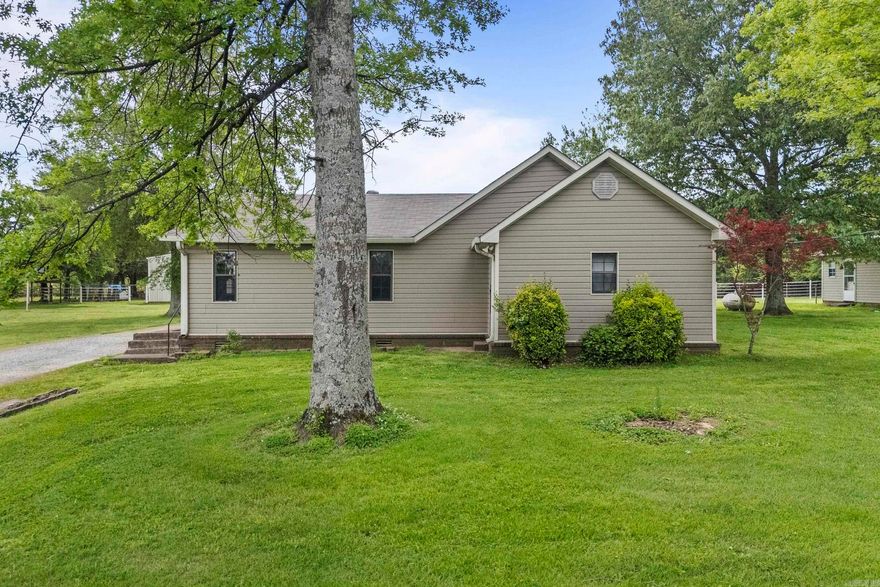 This unique property truly has it all! Perfectly situated just steps away from White County Central Schools. With two homes, a spacious shop, and 7 fenced acres, this property is a rare find! The main house is thoughtfully designed for comfortable living, while the second home, a cozy 2-bedroom, 1-bath dwelling, is ideal for extended family, guests, or as a fantastic rental income opportunity. Roof and HVAC replaced Spring 2024. The massive 33 x 48 shop is a hobbyist’s dream—whether you need storage for toys, tools, or a workspace, you’ll find ample room here to let your passions thrive. The fully fenced 5-acre property is perfect for livestock, gardening, or simply enjoying the beauty of the outdoors with the pond. With ample space and versatility, the possibilities are endless!  Don’t miss the chance to own a versatile property that checks every box. Square footage approximate, please measure.  Mineral rights don't convey.