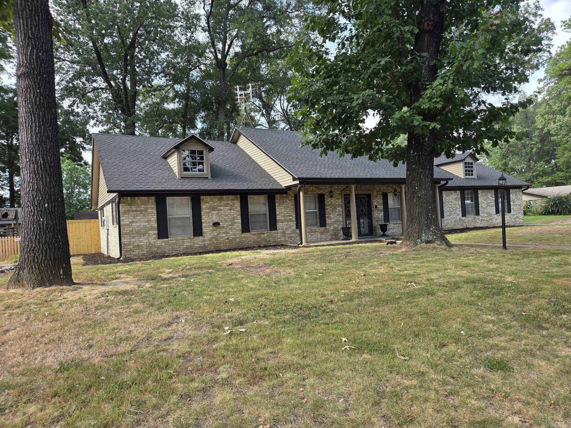 All Electric totally renovated Gold Medallion Home with 3 bedrooms & 2 baths but other rooms that could be used as additional bedrooms such as office, sunroom & second living area. Lot's of storage including a maintenance room/shop, large separate laundry room & lots of closets & built-ins including a walk-in & regular closet both in the main bedroom. Two outside storage buildings & huge backyard deck for entertainment. Desirable location close to Hospital, Harding University, churches & schools, restaurants & shopping. Updates include New Roof, New vinyl siding, gutters & leaf guards, New Privacy fence, New porcelain & Ceramic countertops, GE profile slate appliances, split HVAC systems with smart programmable thermostats, Smart 50 gal water heater & too much to list.