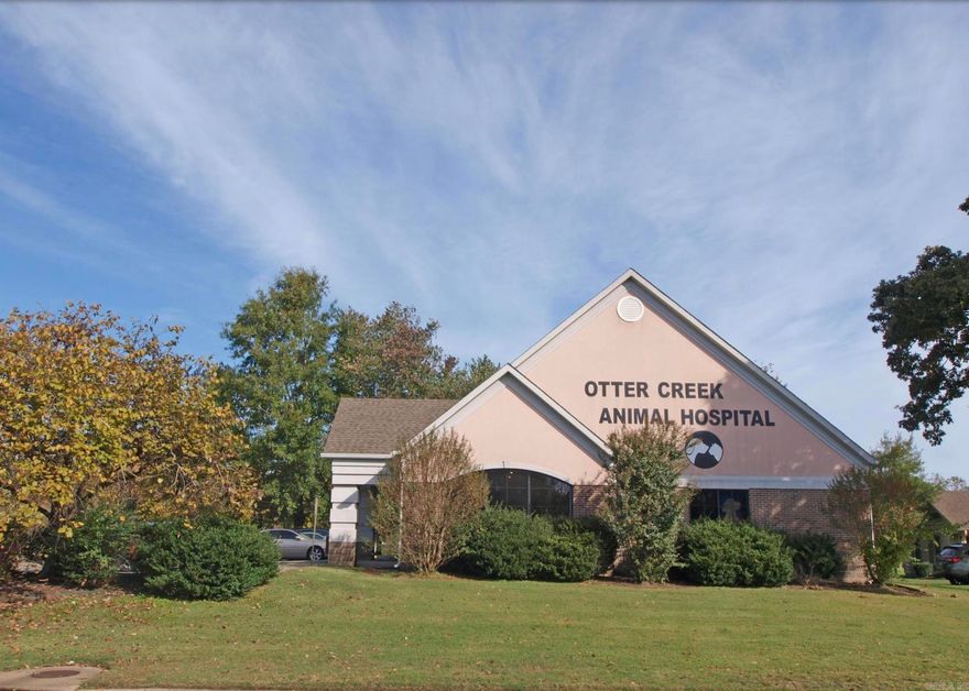 Prime commercial property in the desirable Otter Creek neighborhood of Little Rock, AR. This property, previously a veterinary clinic, offers a turnkey setup for a new animal hospital or adaptable for other medical or commercial uses. Features include a large reception area, 4 exam rooms (3 with plumbing), a surgery room with lighting, lab area, doctor's office, break room, kennel area with extensive plumbing, washer/dryer, 2 ADA restrooms, and a sprinkler system. Ample parking is available, with potential for more. Located in a sought-after area with easy access to shopping centers like Bass Pro Shops and the Outlets of Little Rock, schools, and major highways. Currently leased to a non-medical company supporting the Little Rock school district, providing potential income for the buyer until the lease term ends.