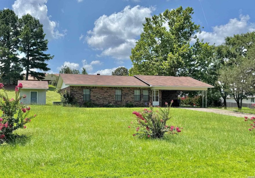 This well-maintained 3 bedroom, 2 bath brick home offers comfortable one-level living on a spacious 3/4 acre lot. Located just 3 miles from Lake Hamilton School, it’s perfect for families or for anyone looking for a spacious property in a super convenient location. Inside, you'll find generous walk-in closets in all bedrooms and a private en suite bath off the primary bedroom. The large yard offers plenty of room to play, garden, or entertain, and includes a handy outdoor storage building.  Affordably priced and being sold as-is—don’t miss this great opportunity!