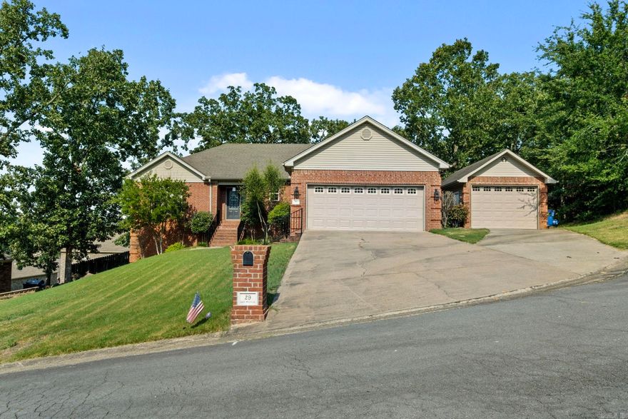 You will not find a home so well loved like this often. From all new fixtures, a completely remodeled kitchen, and an additional detached garage (with smart car charger) this is a must see for you! Believe it or not this one looks better in person. There is a breath-taking view of the lake whether you are walking in your front door or enjoying a cup of coffee on the deck. Not only does this home feature stunning touches, but the split floor plan also boasts oversized rooms and large closets! Magness is so much more than your typical neighborhood. Featuring a walking path across two bridges, multiple sports courts including basketball, a playground, picnic spots and a top-rated elementary school right at the entrance! Schedule your showing NOW!