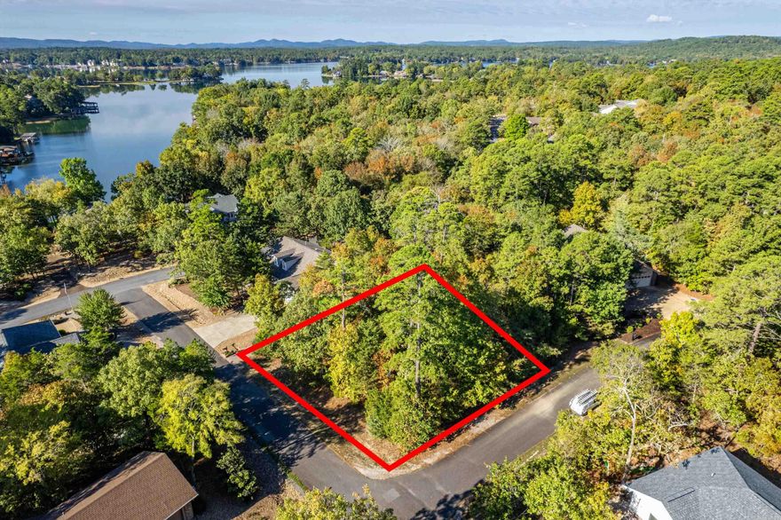 Don't miss the chance to secure your slice of paradise in Hot Springs Village. Embrace the opportunity to build the home you've always dreamed of in a location that shows off the best of Arkansas' natural beauty in North America's largest gated community. Your dream home awaits on this great level corner lot next to Lake Balboa. For more info on HSV go to www.explorethevillage.com. Hot Springs Village Property Owner Association has a new member buy-in fee of $250.00.