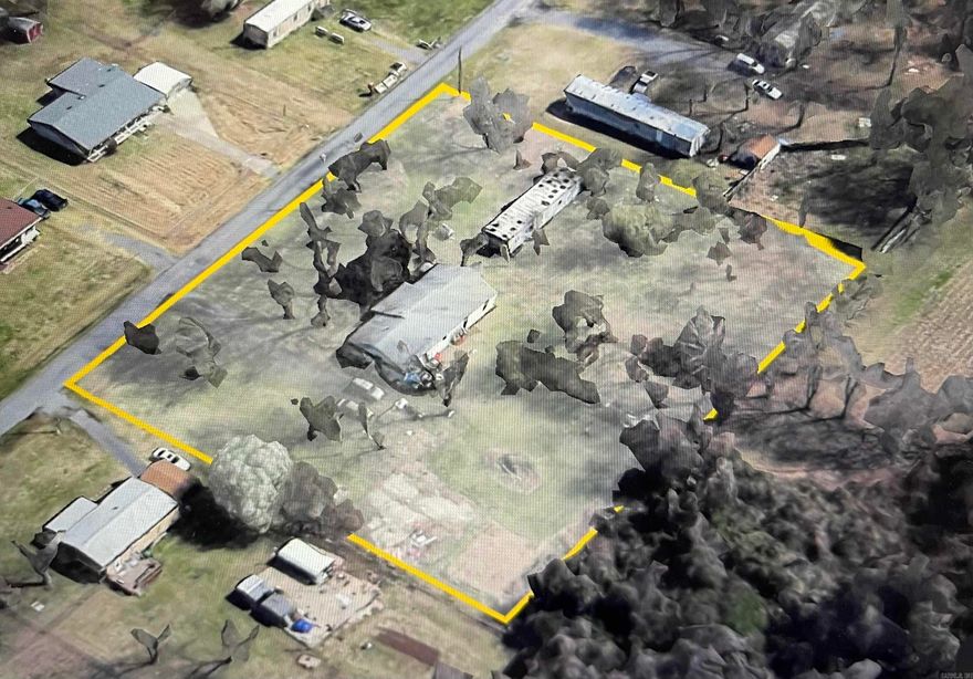 TAKE A DRIVE TO THIS NEIGHBORHOOD TO CHECK IT OUT! NEAR STONELINKS GOLF COURSE! CLOSE TO FREEWAY ACCESS,  BUT AWAY FROM ALL THE NOISE OF THE CITY!  STRUCTURE AND TRAILER ON PROPERTY WILL CONVEY AT NO VALUE.  NOT LIVABLE.  THIS WOULD BE A GREAT SPOT TO BUILD YOUR FORVER HOME!