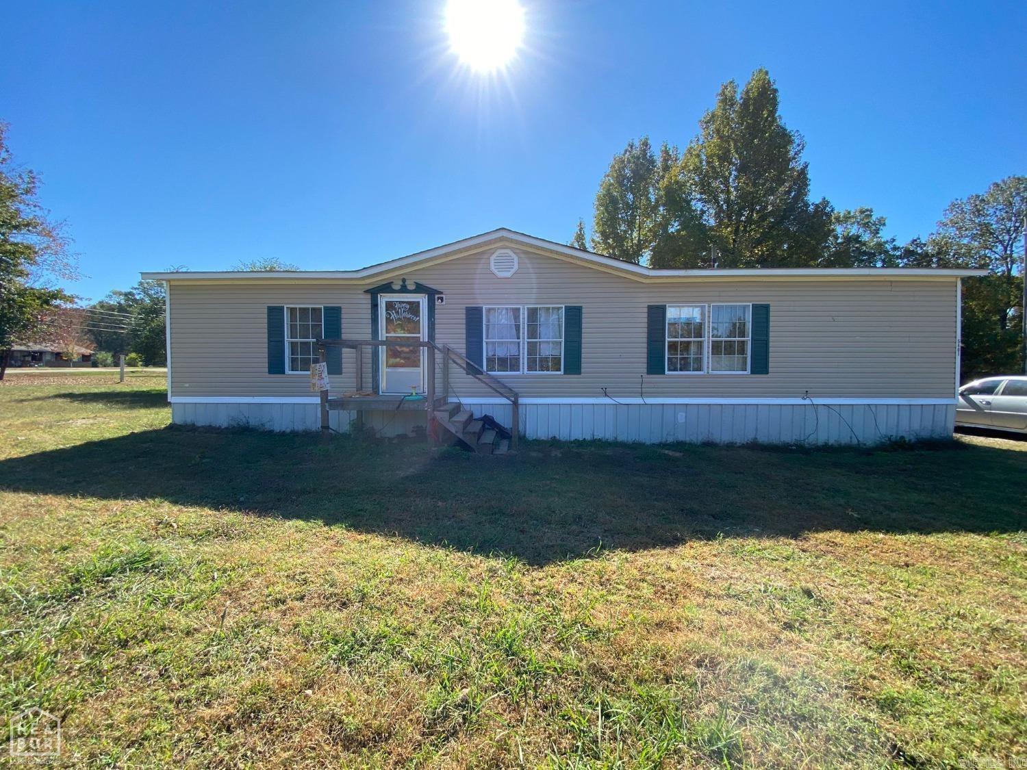 This cozy mobile home is situated on a peaceful lot with plenty of space for outdoor activities. Featuring 3 bedrooms and 2 bathrooms, it's the perfect spot for those seeking a quiet country retreat while still being close to the conveniences of Cabot. The property offers a large yard with ample room for gardening or just relaxing. Conveniently located just a short drive from Hwy 67/167, it provides easy access to shopping, dining, and schools. Great potential for both first-time buyers and investors alike!