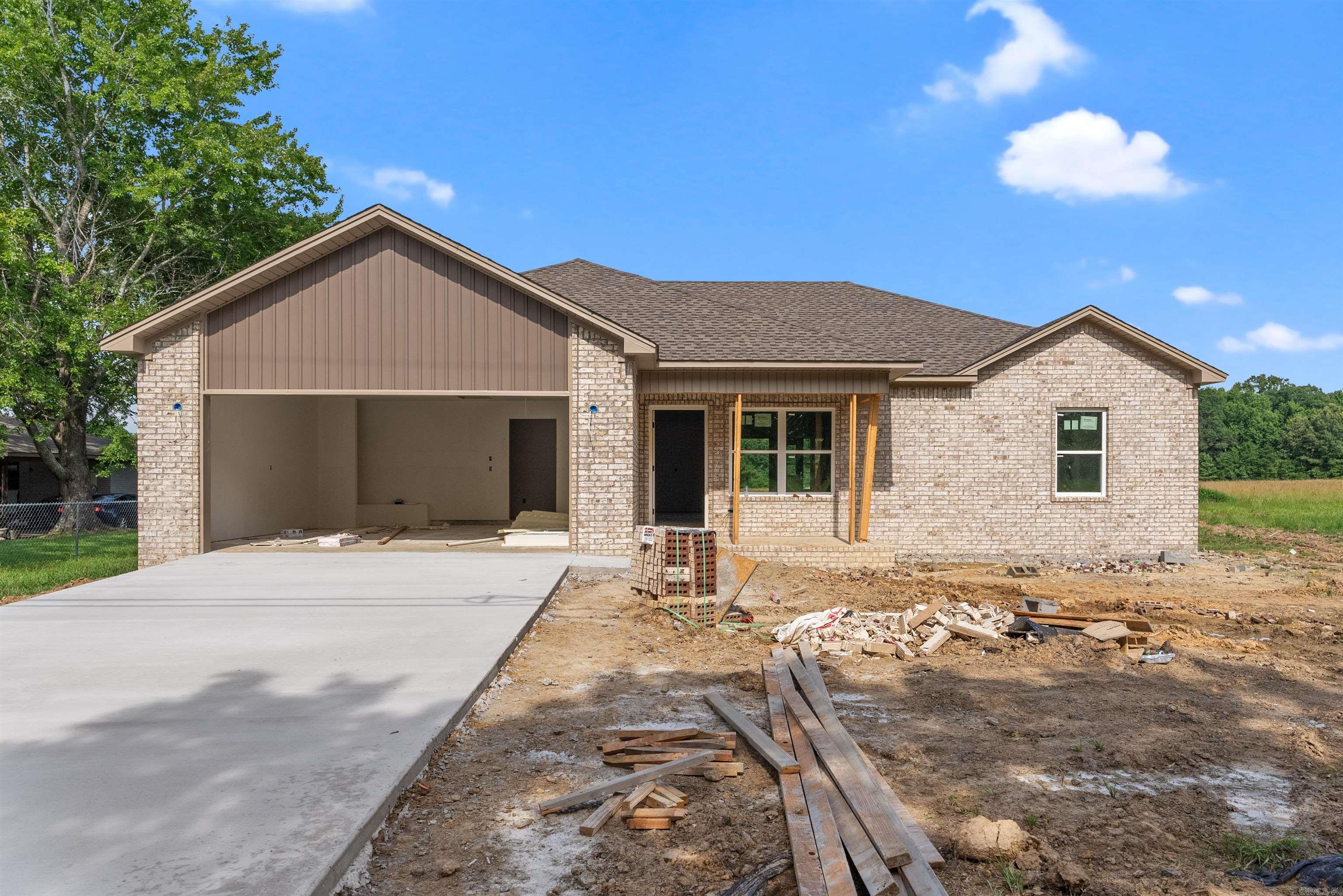 Welcome to this quality, new construction home built by Thomas Long Homes. This home features our Arkansas Plan - a fan favorite - with 3 bedrooms, 2 bathrooms, vaulted, open concept kitchen/dining/living, a great covered back porch, and a separate laundry room! Estimated completion is around the middle of August. The interior will feature luxury vinyl plank floors throughout, tile shower in primary bath, granite countertops, and more! Minutes from I-57 and close to Highway 319, these homes are great for anyone working in Cabot, Beebe, Little Rock, Conway, or Searcy. We can't wait for you to make this your new home! Agents, please see remarks.