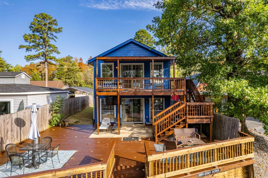 Discover your dream lakeside retreat! This fully furnished waterfront property is perfect for an Airbnb investment or your personal getaway. Boasting a spacious bedroom area.  Comfortably sleeps 5-6 guests between the upper and lower levels, it’s equipped with everything you need, including paddle boat, fishing poles, and all essential lake accessories.  Enjoy breathtaking views from the newly renovated covered upper deck, ideal for morning coffee or sunset relaxation. The interior features a stylish new tile shower and fresh paint throughout, enhancing its inviting atmosphere. With new flooring on the lower level and an HVAC system installed in 2022, you’ll find modern comfort in every corner.  Step outside to the lakefront boardwalk, perfect for swimming or tying up your boat. This charming property seamlessly blends adventure and tranquility, making it a must-see for anyone looking to embrace the lake lifestyle. Get creative with a reading nook or play area in the additional loft with pull down steps. Don’t miss out on this fantastic opportunity—schedule your viewing today!