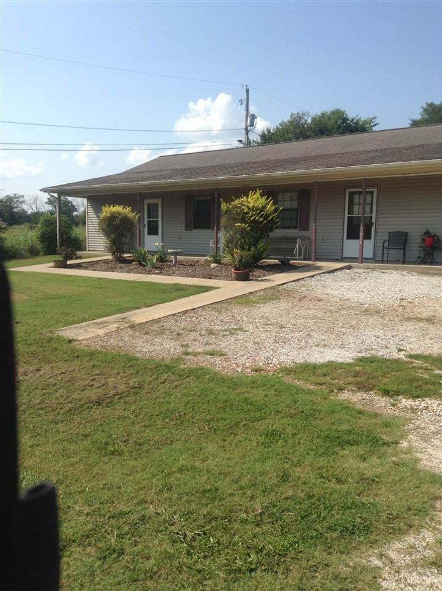 A very affordable opportunity to own your own rental or if you want to live in one and rent the other, here is a very nice place with a convenient location, and nice view of the mountains.