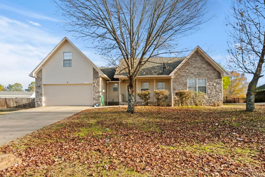 Beautifully updated 4 bedroom on over .5 acre!