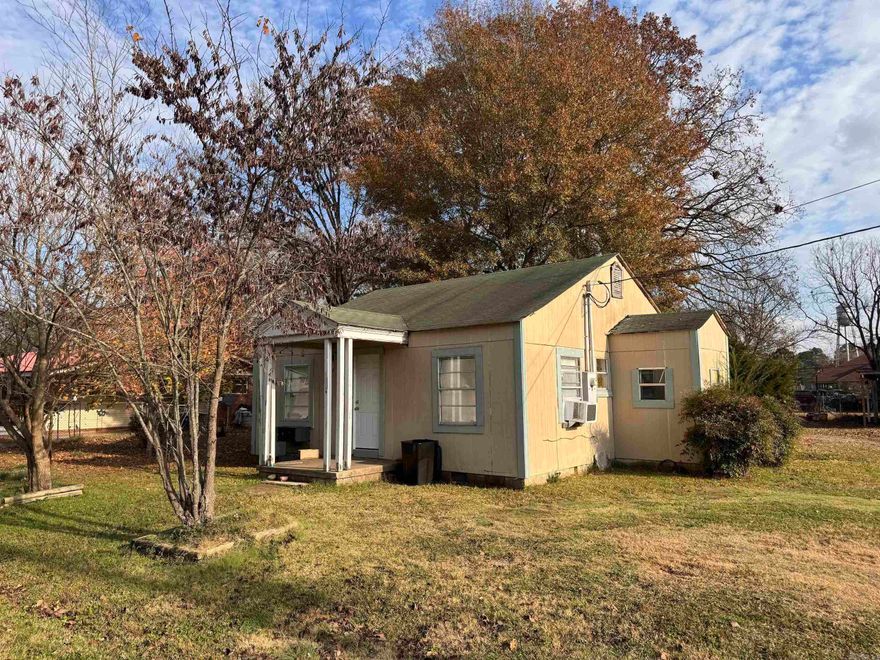 For investors and buyers ready for some home improvement, this is the one. This 2 bedroom 1 bath home can be purchased with adjacent property. Lot lines to be established with adjacent home. Two window heat and cooling units. Kitchen appliances included. Tenant occupied, 24 hour notice required for showings. See agent remarks.