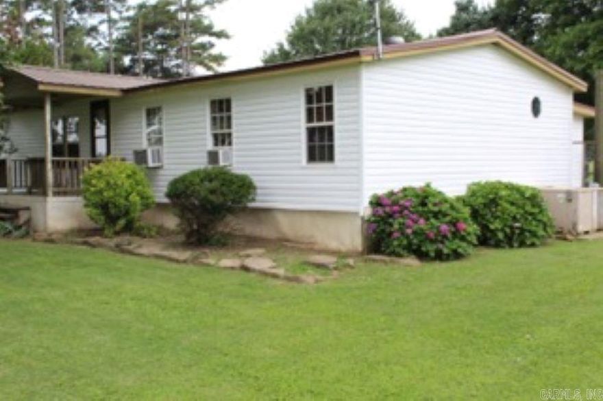 Spacious four-bedroom, three-bath manufactured home nestled in the peaceful countryside. Recently updated with brand-new vinyl siding; this home blends modern appeal with the tranquility of country living. Inside, you will l find a generous floor plan offering plenty of room for family and guests, with a spacious Living room that would be great for entertaining and relaxation. Additional bedrooms and baths ensure comfort and convenience for everyone. Surrounded by open skies and natural beauty. Perfect balance of quiet country charm with modern updates.