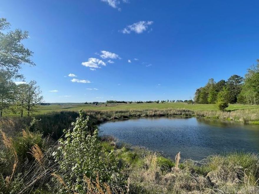 Quiet, secluded farmland between Quitman & Heber Springs off Hwy 25. Less than 10 minutes from Greers Ferry Lake. Adjacent to beautiful Bettis Mountain Estates. Paved Road Access. Multiple spots to build a home. Rich Bermuda & Fescue Pasture. In the desirable Quitman School District.  Will need to drill a well for water. Pond. Gas pad is still in use but is very quiet. Underground power at the road.