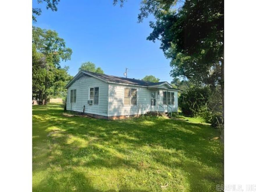 Awesome property for a fixer upper. 770 SQFT of the home is divided into an apartment which easily could be converted into a duplex. This is a perfect opportunity for a rental property. 4 extremely beautiful pecans trees are located in the yard that shade the home. Please reach out for a tour