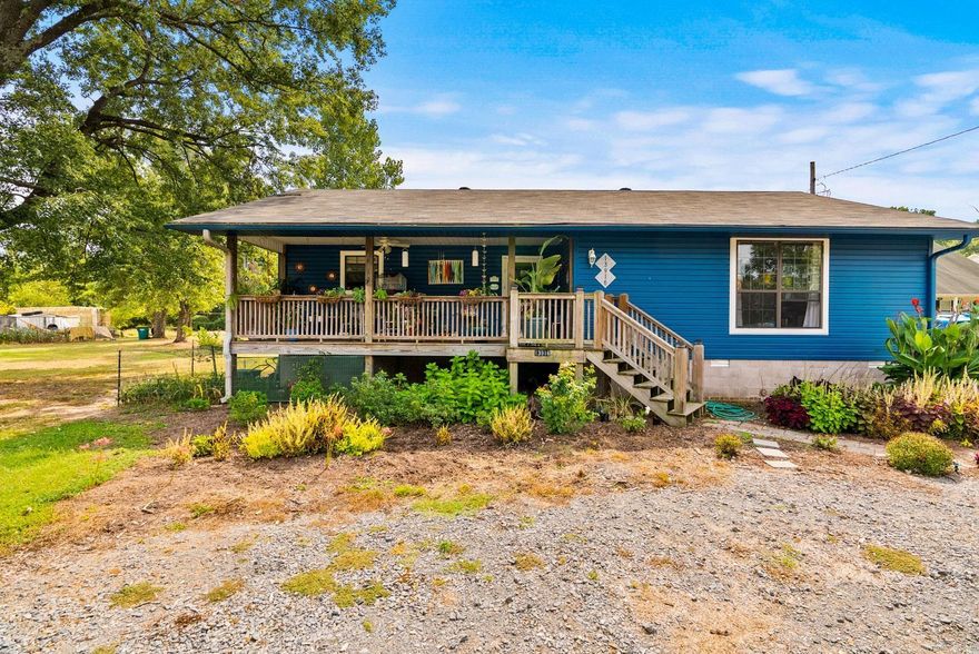 Garden lovers dream!!! Take a look at this adorable home sitting on almost an acre!  With a picturesque garden surrounding the home, you can enjoy your time and space outdoors.  With multiple spaces for chickens, a beautiful greenhouse, riding lawn mower ,and a spacious sitting porch out front, your green thumb will blossom!  The home boasts a large living area, open concept kitchen, dining, and living room, 2 large bedrooms and 2 full bathrooms.  Eligible for zero down rural development loans.  Refrigerator, washer, and dryer convey. Don't let this one slip away!