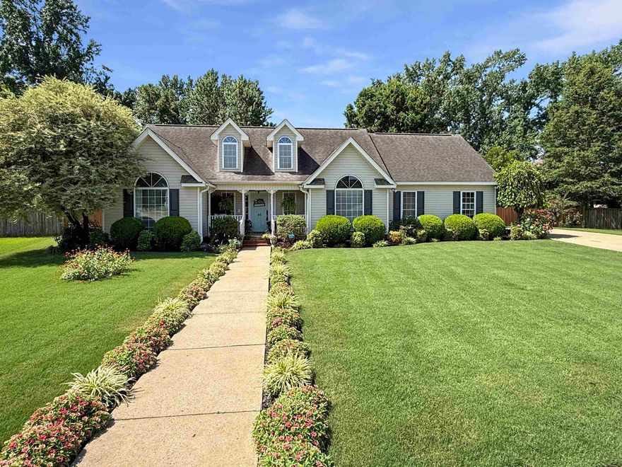 This immaculate home offers standout curb appeal and a layout that’s both functional and inviting. A flexible bonus room near the entry could serve as a formal dining room, den, office, or sitting area. The main living space flows openly into the kitchen and dining, creating a comfortable area for gathering. The spacious primary suite includes French doors that lead to one of the back porches. Out back, you’ll find a vaulted porch that is a true outdoor retreat—ready for quiet moments or lively gatherings. The large fenced yard features mature landscaping, a play-set, and a charming shed. The side-entry garage adds to the home’s overall appeal, and the well-maintained yard is highlighted by beautiful crepe myrtles in full bloom. It’s a one-of-a-kind property with thoughtful details and is ready for you to make it your own.