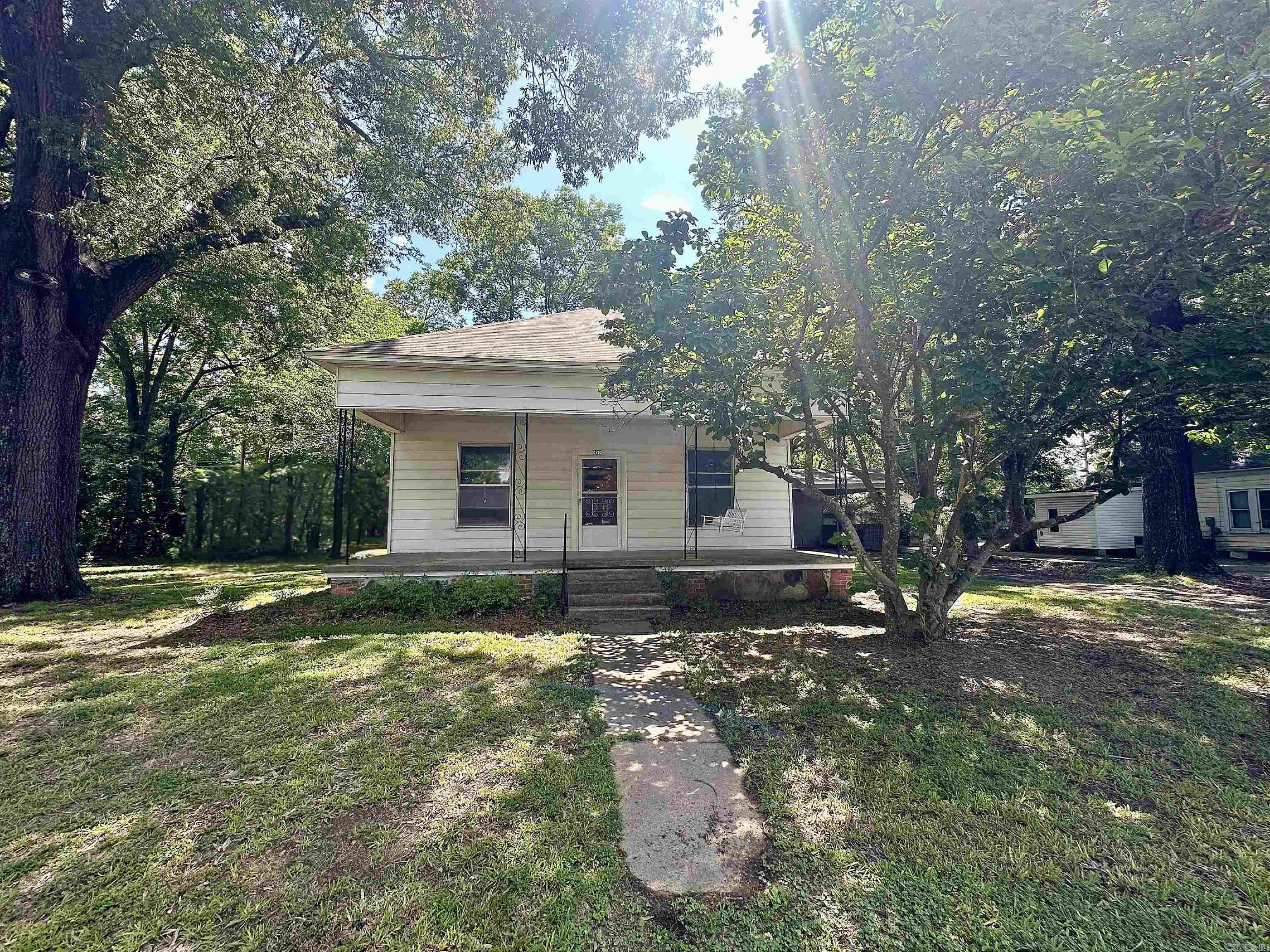 Charming Fixer-Upper with Endless Potential in Prime Location! Built in 1970, this character-filled home offers a rare opportunity to bring your vision to life while preserving its timeless charm. From the moment you arrive, you'll fall in love with the welcoming front porchāperfect for relaxing afternoons and morning coffee. Inside, this spacious home is full of potential and ready for your personal touch. Whether you're an investor, a DIY enthusiast, or simply looking for a larger home at a great value, this property is bursting with possibilities. Located just steps from Bald Knob Schools, local restaurants, and everyday conveniences, the location couldn't be better. Don't miss this chance to create the home you've always wanted in a quiet and charming neighborhood. Come see the opportunity for yourself!