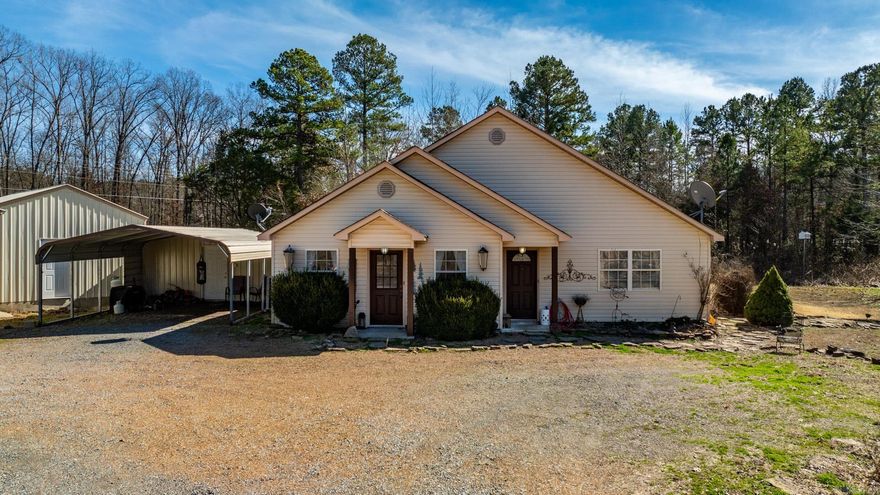 FIBER INTERNET & 1.5 MILES FROM THE LAKE! This property has endless possibilities! As you walk in, you'll be attracted to the beautifully vaulted ceiling and how open the living room and kitchen are. From the kitchen, you'll walk out into a bright and inviting sunroom with windows all around. Watch deer and other wildlife in your backyard from the comfort of the sunroom. Sunroom is not included in the square footage. There are four bedrooms with a laundry room next to the master bedroom. Next to the house is a two-car carport with storage and a spacious shop with three phase/commercial-grade electricity and a furnace to keep you warm in the winter. There is another storage building next to the shop. On the back of the property, there is a septic system, electrical, water meter, and a large, sturdy deck already in place for an additional house. Build an AirBnB or the home you've always wanted, and use the current house as an investment property. 1.5 miles from Peter's Sugar Loaf Marina and Greers Ferry Lake. Property Disclosure and survey on file. Be sure to watch the video walkthrough on YouTube!