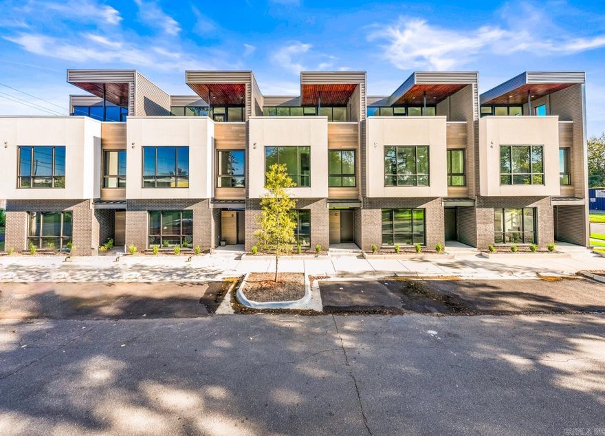 Brand new luxury townhomes located in the heart of North Little Rock’s thriving creative corridor, the Argenta Arts District. Within walking distance to many restaurants and venues including, Blackberry Café, Skinny J’s, Capeo’s, Crush Wine Bar, The Joint Comedy Club, Flyway Brewing, Reno’s, Argenta Plaza, Simmons Bank Arena and Dickey Stephens Park. These stylish townhomes provide a dynamic environment where the excitement of the city is right at your doorstep, offering an exceptional blend of convenience and luxury. 3-units available. 3-story, 2,100 SF, with open living/eating area, spacious kitchens, a half bath downstairs and 2 bedrooms, 2 spa like bathrooms and laundry room upstairs. Third floor includes a bonus living room and an amazing, covered rooftop deck. Each unit has a 2-car garage. You will love the oversized bedrooms and storage space throughout. Come see today! SEE AGENTS REMARKS PLEASE.