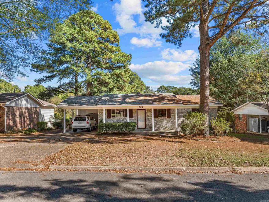 Beautifully Maintained One-Owner Home in the Heart of Benton!  This well-cared-for home offers 3 bedrooms, 1 full bath, and 2 half baths, plus a spacious den that could easily serve as a 4th bedroom.   You’ll love the outdoor amenities — an 18' x 24' shop and 8' x 12' storage barn, both with electricity, and a 12' x 8' playhouse perfect for kids or additional storage. The backyard provides plenty of room to enjoy outdoor living with a deck, and a patio...AND, it's fully fenced!  In addition to the one-car carport, there is ample parking for other vehicles. Inside, the home features beautiful wood laminate flooring in the main living areas, fresh paint in many rooms, and a new roof (2023). The kitchen includes pull-out cabinets, a brick backsplash, and newer appliances — including a gas stove, dishwasher, and microwave. Additional highlights include a laundry room and a kitchen pantry. This home has been lovingly maintained and is ready for its next owner to enjoy!