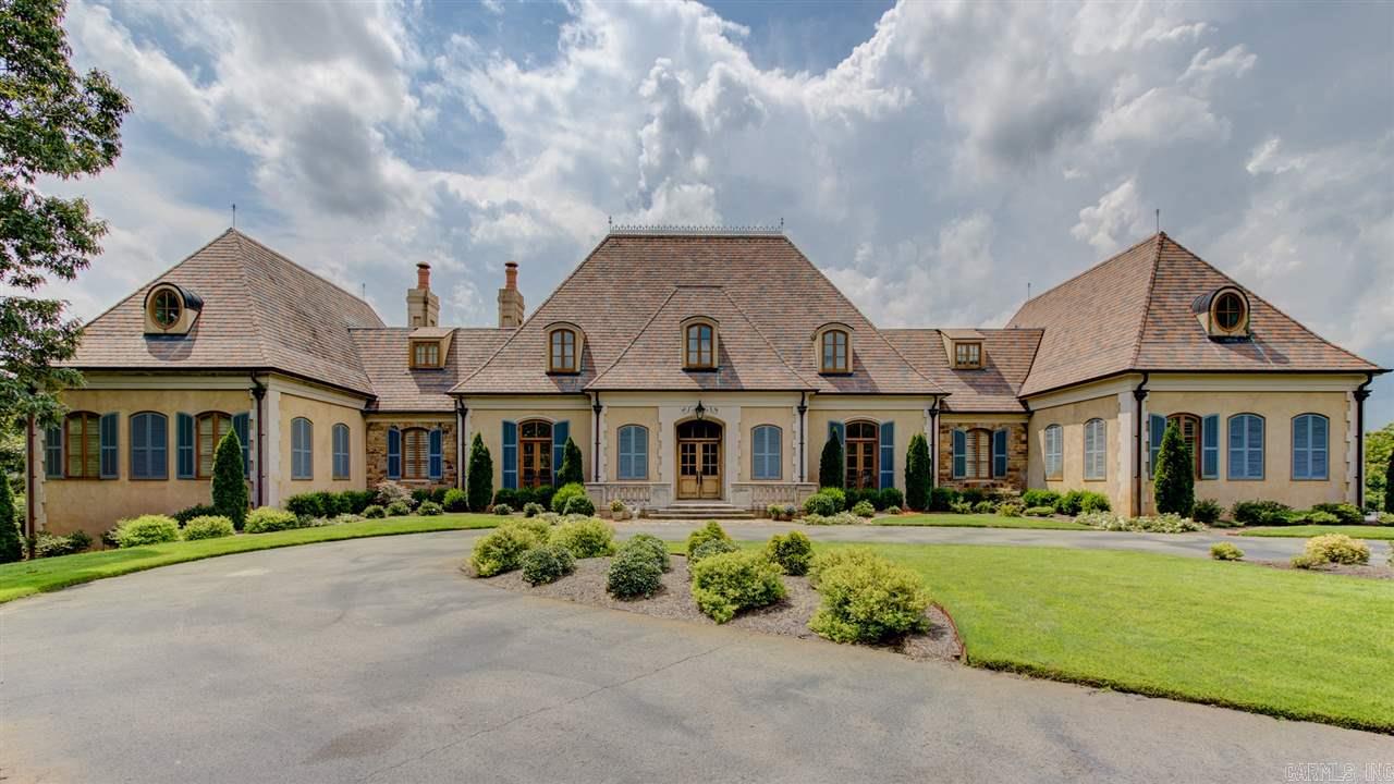 Magnificent & Luxurious French Country Estate-Panoramic vistas of mountains & lake. Entry, Dining Room, Gallery have natural limestone floors. Limestone counter tops in kitchen & baths. Climate controlled Wine Cellar & Wine Dining room. Entertainment area & full kitchen lower level next to stone pool deck. Kitchen/Den see-thru Rumford FP. All doors & windows custom made. Master BR has private covered veranda w/stone deck, wood ceiling, cast stone railing. Slate roof w/copper flashing & copper roof drains.