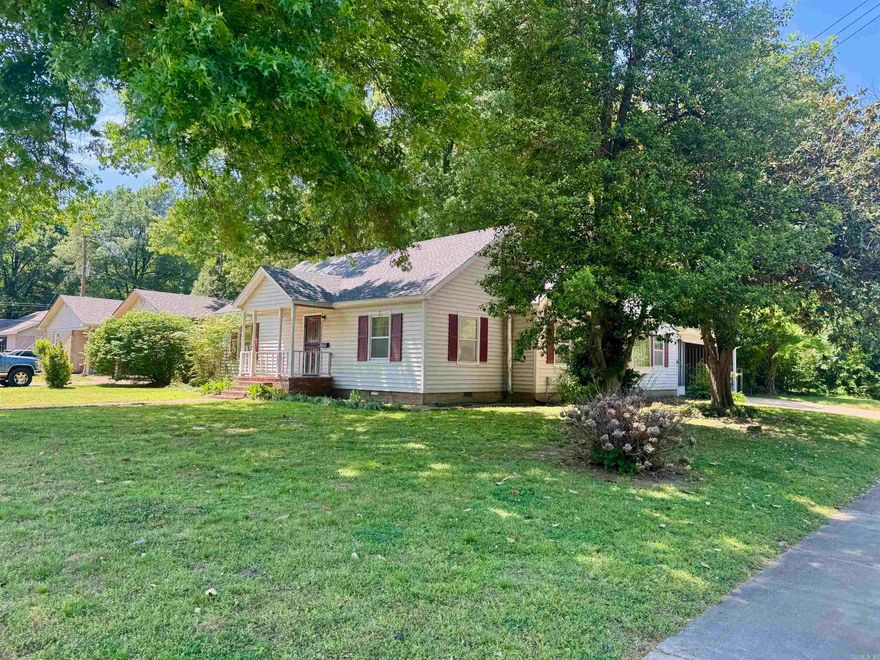 Tired of the cookie cutter new construction homes? This home has character & curb appeal all wrapped up in a nice layout. There are 2 living areas, 2 bedrooms, & a bath on the main & a 3rd bed & bath upstairs with loads of closet space. You will love the cozy deck off the breakfast area. There is also room for either a formal dining room, office. or playroom off of the kitchen. The backyard is fenced and has a metal outbuilding.