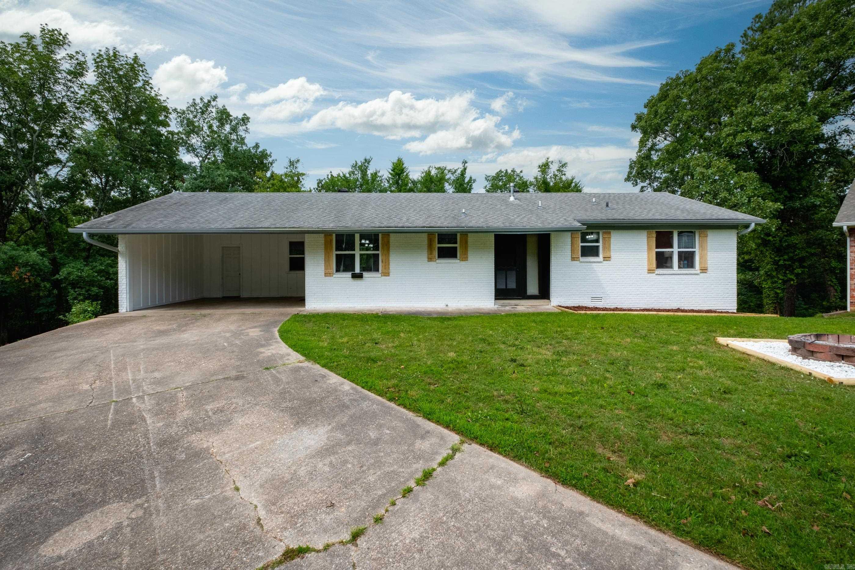 Located on over an acre in a quiet cul-de-sac with green space behind, this home offers rare privacy while being just minutes from everything Park Hill has to offer. Inside, enjoy new exterior and interior paint, new flooring throughout, and a fully updated kitchen plus renovated bathrooms that combine modern style with everyday comfort. The main level features two bedrooms, two full baths, and a flexible room that is perfect for a home office or nursery. Downstairs offers two bedrooms, a full bath, a spacious bonus room, and a laundry room. Many major systems have been recently updated for peace of mind: the roof is 3 years old, the HVAC upstairs and water heater are 2 years old, and new blown-in insulation adds energy efficiency. This home has it all—updated finishes, smart layout, and a location that can’t be beat. Come experience the best of Park Hill living!