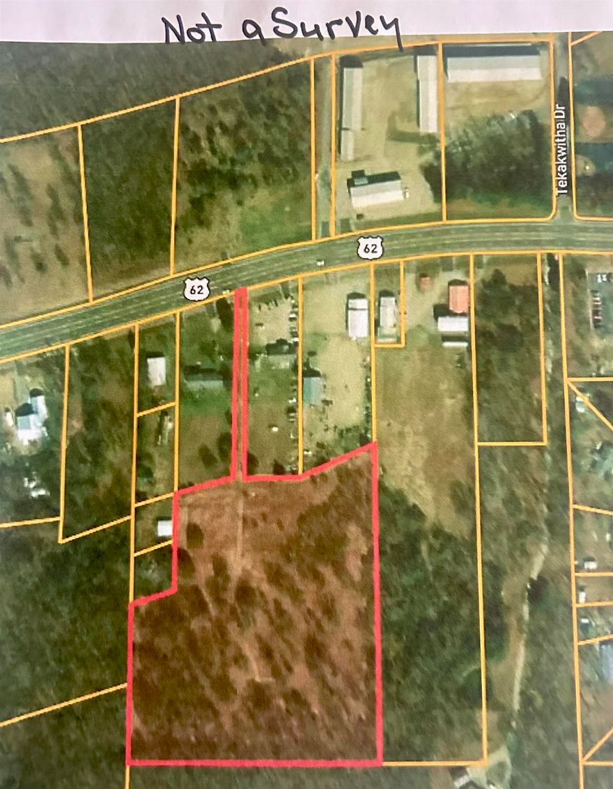 This 7+ acres is located in Highland.  There is an easement from the highway.  The property lies behind the house and gives a more rural feel.  Plenty of room to build a home off the highway for privacy.  City water and sewer are available.  Prime location between Ash Flat and Hardy, AR.  The property lies mainly flat and is a mix of cleared and wooded land.