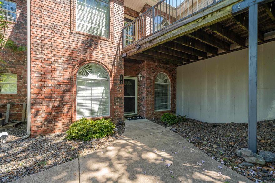 Welcome to your new waterfront retreat on the outskirts of Hot Springs! This stunning walk-in level 3-bedroom, 2-bathroom condo offers 1,626 square feet of beautifully updated living space with all the benefits of low-maintenance living. Step inside to effortless walk-in access with no stairs and no hassle. Every corner has been thoughtfully refreshed, showcasing modern updates that blend comfort with contemporary style. The primary bedroom serves as a private sanctuary, while the gorgeous tile shower transforms your daily routine into a spa-worthy experience. The breathtaking waterfront views provide the perfect backdrop for morning coffee or relaxing sunsets. Community amenities include an 18-hole golf course, swimming pool, clubhouse, boat ramp, and nearby horse-riding stables, offering endless opportunities for recreation and relaxation. Plus, Lake Catherine State Park is just around the corner, providing easy access to hiking, boating, fishing, and outdoor adventure. This gem just hit the market, and opportunities like this do not linger. Schedule your private showing today before someone else calls this paradise home!