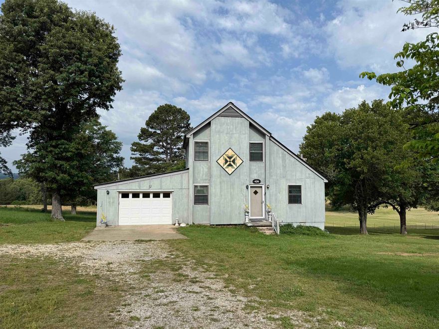 Charming and full of character this unique 3 bed, 2 bath home sits quietly on the edge of town. Enjoy peaceful views of the neighboring pasture and large pond from the screened-in back porch, complete with side decks on each side for extra outdoor entertaining and enjoyment. The home features a Jack-and-Jill bathroom upstairs and a walk out basement opens to a private patio area to enhance the home's uniqueness. Recent updates include a new HVAC system installed May 2026 along with other upgrades. The metal roof is only a couple years old as well, adding comfort and peace of mind for the new owners. This home checks the boxes for charm, privacy, and beautiful views all while being close to town.