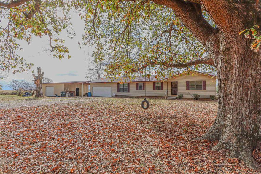 Welcome to the market, 2530 SFC 867 in Palenstine, Arkansas in the Palestine-Wheatley School District! If you've been waiting for an affordable country oasis nestled under mature shade trees and surrounded by rich farmland - here it is! Situated on a large 2 acre parcel, this property would make the perfect opportunity for your dream homestead with no restrictions, an existing barn, chicken coop with run, partial boundary fencing, and a large attached 24x30 shop with electric and garage door. The home features 3 bedrooms and 2 full bathrooms, with the master suite being oversized with an updated full tile shower, custom cabinetry, and walk-in closet. The kitchen is generously laid out with a breakfast nook, and the semi-open floor plan of the main living areas to allow for perfect flow of entertainment space perfect for your holiday guests to enjoy! Parking won't be an issue with the attached garage and attached carport combo. More updates and upgrades include but are not limited to: HVAC (2023), separate septic systems for both bathrooms, metal roof, painting, flooring. No need to fear the upcoming winter months thanks to a secondary heat and energy source being propane.