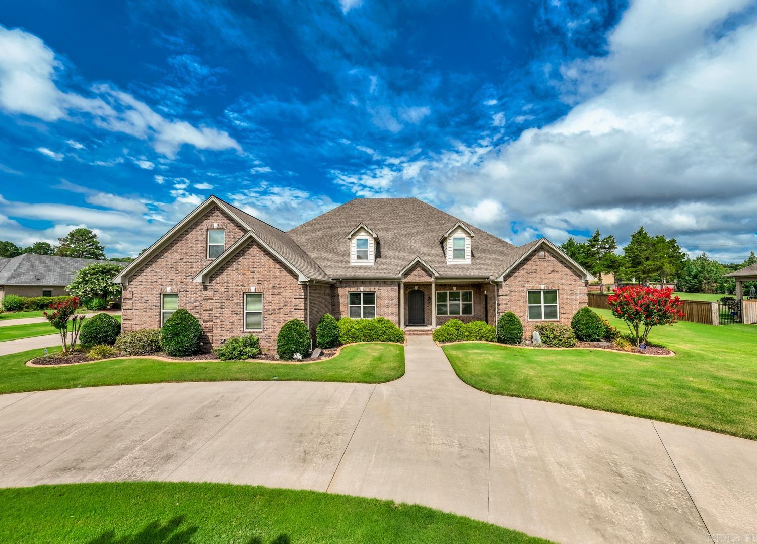 Luxury living at its finest in West Conway’s prestigious Huntington Cove Subdivision! Situated on a beautiful manicured 1.12 acre lot, this immaculate, custom-built masterpiece offers 5,549 square feet of living space, 5 bedrooms, 3 1/2 bathrooms, office, study & bonus room. Meticulously crafted featuring a desirable split floor plan w/ crown molding, luxury vinyl plank flooring & versatile bedroom that can serve as an office w/ its own exterior entry door. Entertain in the open living space with two dining areas & chef’s kitchen boasting a large breakfast bar, granite countertops, island w/ sink, high-end appliances such as paneled Sub-Zero refrigerator, Bosch double ovens w/warming drawer, microwave & glass cooktop. Huge walk-in pantry & mud room add to the functionality. The primary suite offers a sitting room & sunroom, a luxurious bathroom w/ granite countertops, double sinks, vanity, jacuzzi tub, separate shower. Relax in the heated & cooled sunroom featuring built-in grill, sink, mini fridge & gas fireplace. Other features include safe room w/ built-in gun closet, security system, central vacuum system, gutters, sprinklers & oversized 4-car garage. Schedule a tour today!
