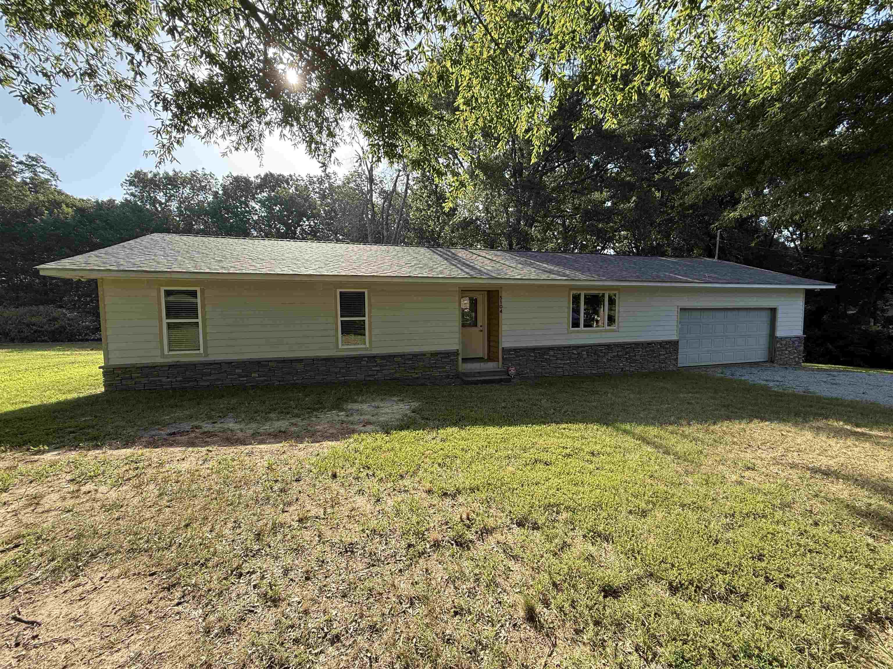 This little gem is awaiting new owners, all new hardy board being painted with stone accents and a new deck being built on back, woods in the back offer a serene privacy along with the house sitting on two lots, offering a little elbow room is always nice! The updates are plenty when you see this kitchen with corian countertops and all luxury plank flooring throughout, updates neutral paint and decor including wood accents at the front door and cypress shutters being made custom for this three bedroom home! Call to view this one fast! Hardy board will be painted mindful gray and trim gauntlet gray. Or if you buy quick you can pick!