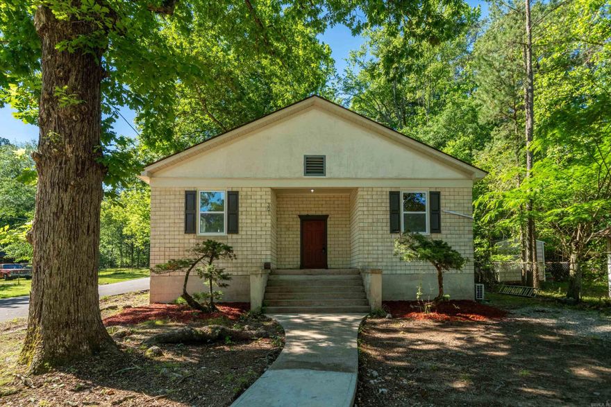 Check out this unique property, used to be an old church converted into a 4 bedroom 2 bath home. This home features tall coffered ceilings, open floor plan, has a new fireplace, quiet quaint neighborhood in the downtown area off of Whittington.
