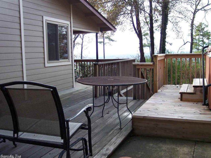 Unique, secluded mountainside paradise with fantastic views. Convenient to everything. 3 br 3.5 ba on 4 acs. Recent upgrades include new roof, energy-efficient windows, Hardy-board siding, inside/outside paint, deck, sun room, tile, carpet, granite counter-tops, cabinets, stainless steel appliances, walk-in pantry and remodeled baths. Rustic charm and modern convenience are combined in this one-of-a-kind home. Enjoy the rock patio with huge fire pit plus 3 out buildings and several fruit trees.