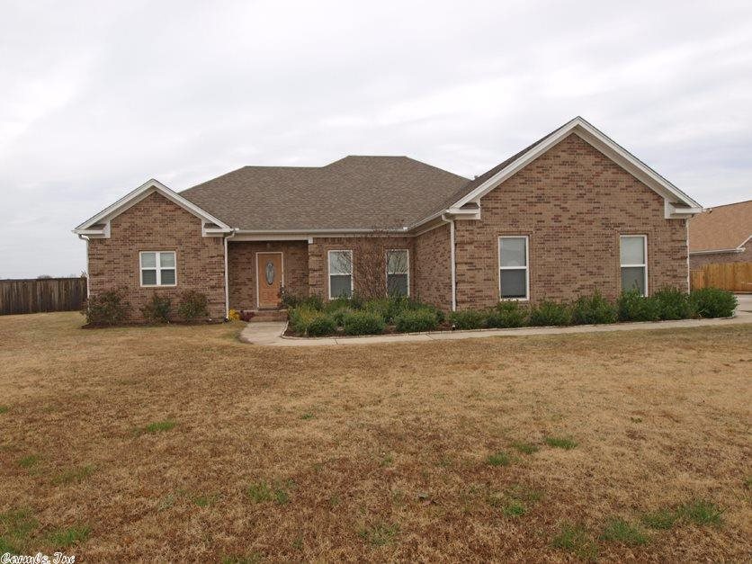 Best buy in Ashley Downs, one level on a very flat 1.46 acres, wide concrete drive, 3 car side-load garage, outdoor storage bldg 12'x20' on concrete driveway addition, fully fenced backyard, home has split BR plan, carpet and hardwood floors, tile in the kitchen & wet areas, very open floor plan, Formal DR, gas log fireplace in Greatroom, covered patio area! Professional landscaping in the front. Sale is subject to lender approval!