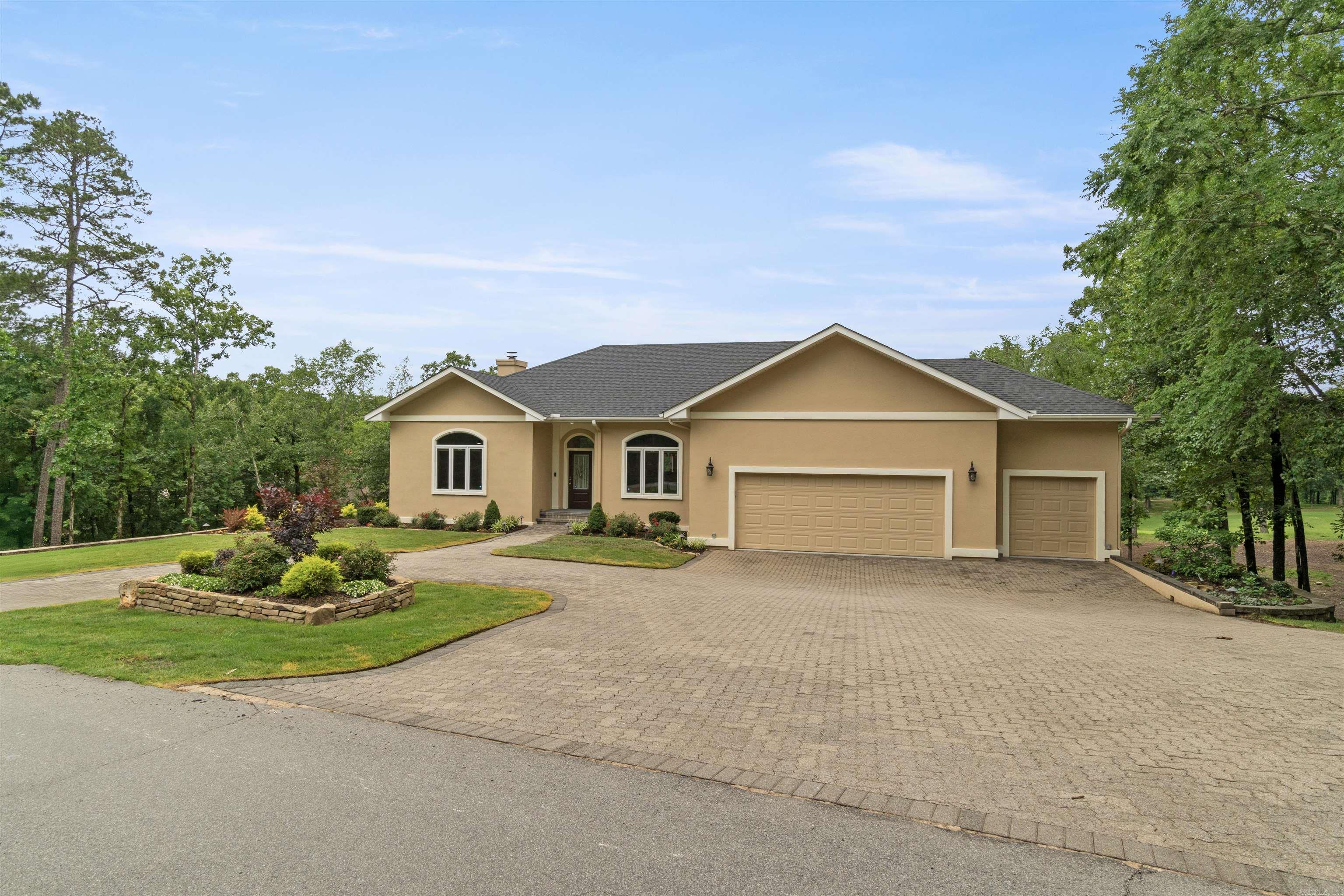 Golfer’s Gem – Expansive Golf Course Views & Better-than-New Updates! Nearly 3,100 sq. ft., this 3BR/3BA home offers stunning views from almost every room. The main level features a spacious Living Room, Dining Room, Kitchen with Breakfast Nook, Primary Suite, Arkansas Room, Guest Wing, and Laundry. Downstairs includes a large flex space for entertaining, an office or storage room, plus a guest room—all overlooking two fairways and a water feature on the golf course. Extras include an encapsulated crawl space and golf cart garage. Enjoy high ceilings, crown molding, all-new interior paint, updated lighting, new bedroom carpets, new sliding doors to the deck, new roof, and epoxy floors in the oversized 3-car garage. The heated/cooled Arkansas Room is perfect for year-round enjoyment. Situated on almost an acre, this property combines luxury, space, and breathtaking views in the heart of Diamante. Too many updates to list so come see for yourself! 1st time HSV buyers are subject to a $2000 buy in fee collected at closing.