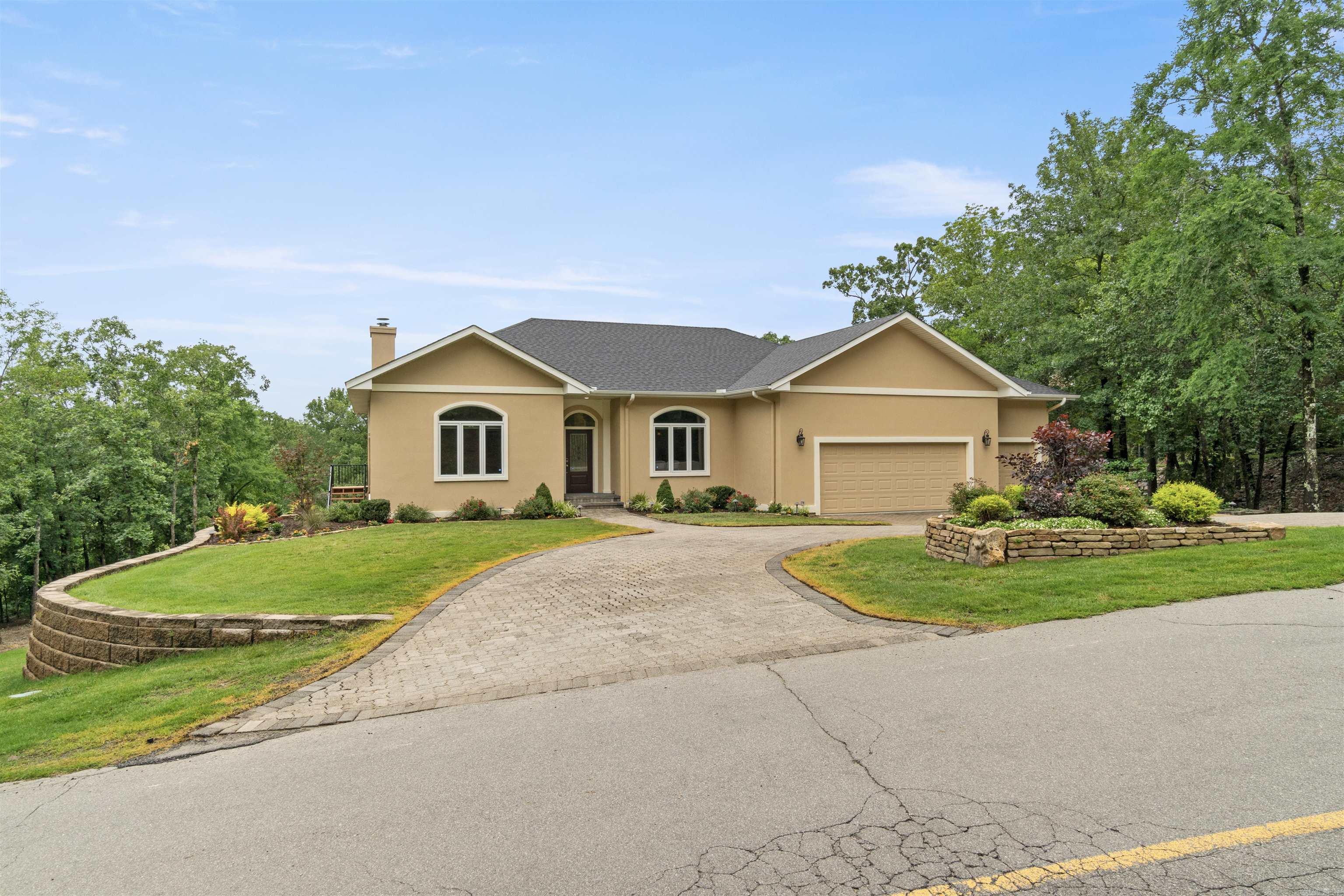Golferās Dream with Sweeping Views & Exceptional Updates! Enjoy panoramic golf course views from nearly every room in this beautifully updated 3,100 sq. ft. home. The main level features a spacious living room, formal dining, kitchen with breakfast nook, primary suite, guest wing, laundry, and a heated/cooled Arkansas Room for year-round comfort. Downstairs offers a large flex space, guest bedroom, and office or storage roomāall overlooking two fairways and a scenic water feature. Updates include fresh interior paint, new lighting, bedroom carpeting, sliding doors, newer roof, and epoxy-coated floors in the oversized 3-car garage. Additional features: high ceilings, crown molding, encapsulated crawl space, and a golf cart garage. Situated on nearly an acre in the Diamante community, this move-in-ready home blends comfort, style, and spectacular views. Hot Springs Village offers golf, lakes, trails, tennis, pickleball, dining, and more. Residents may qualify for the $500 Homestead Tax Credit. Come see it today!