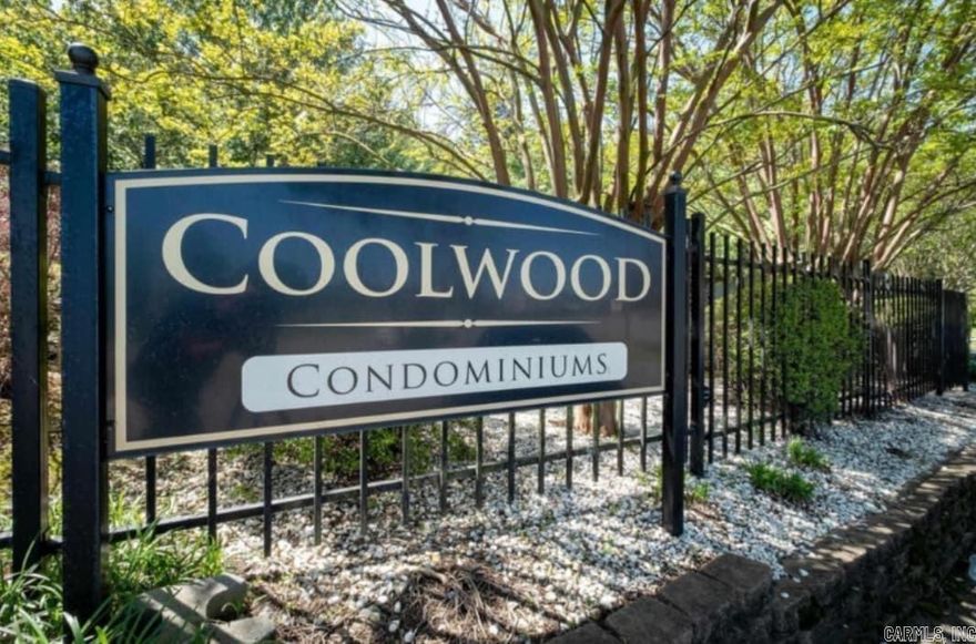Welcome to this ground-floor 1 bedroom, 1 bathroom condo in the desirable Coolwood Condo community, conveniently located just off Cantrell Road. The unit features wood and tile flooring throughout and slab granite countertops in both the kitchen and bathroom for a clean, modern look.  The kitchen comes fully equipped with all appliances, and a washer and dryer are included, conveniently tucked into a bathroom closet. Low utility costs with only electric and cold water billed to the owner—no gas, while the HOA covers hot water and trash service. AGENTS SEE REMARKS  Enjoy your private deck overlooking the pool and beautifully landscaped grounds. The property also offers assigned covered parking located at the rear of the complex, all within a fully gated community.  Ideally situated near restaurants, shopping, biking trails, and downtown, this condo offers both comfort and convenience in a prime location.
