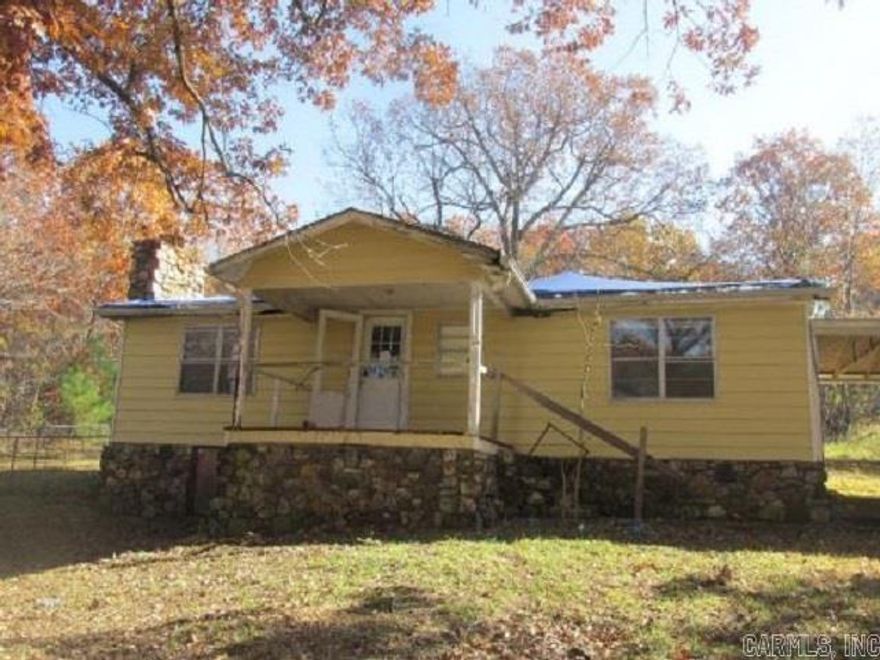 Investment opportunity available, this home offers 3 bedrooms, 1 bath, great room with fireplace and situated on approximately 20 acres. Repairs needed including, paint, ceiling, flooring and roof needs attention. Caution upon entering due to ceiling damage. Driveway is not accessible needs grading/gravel. Possible encroachment issue with neighboring property due to add-on patio or shed, buyer required to sign hold harmless to take as is, sold as is. Sale includes Tax ID #001-00035-000 and 525-22786-000. Buyer to complete due diligence prior to offer, sold as is no inspection contingency