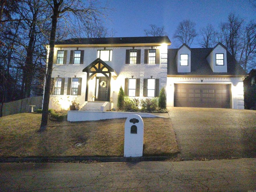 Welcome to this stunning Colonial-style home blending timeless charm with modern living. An open foyer flows into spacious living, dining & kitchen areas with high ceilings, French doors & cozy stone fireplace. The chef’s kitchen boasts sleek counters, custom cabinetry & stainless appliances. Upstairs, the primary suite features a fully updated bath with soaker tub & walk-in closet. Enjoy engineered hardwoods, screened porch, fenced yard with hot tub & prime location near HS Country Club. New HVAC.