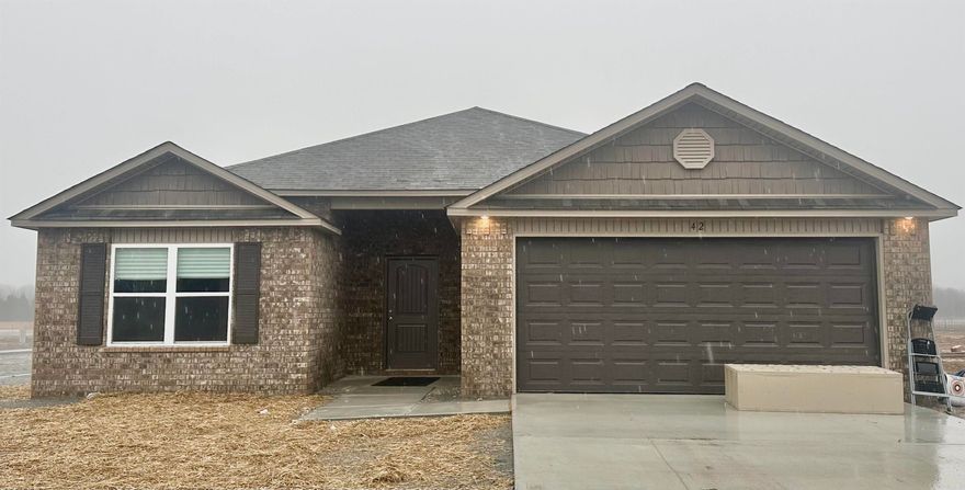 Raleigh plan Corner lot  Upgrades in this home: 14x10 uncovered patio, plumbing faucet upgrade 2, 3 added ceiling fan prewire and brace, door bell, Luxury Vinyl Plank flooring in wet areas and Living Rooms and adjacent hallways, ceilings raised in Living Areas per municipal codes, Cheyenne style interior doors, baseboards level 2, 25in wide attic stairs, LED disk light over Master tub, LED disk light over tub in Bathroom 2, full sod, smooth top range.   THIS HOME IS COMPLETE.