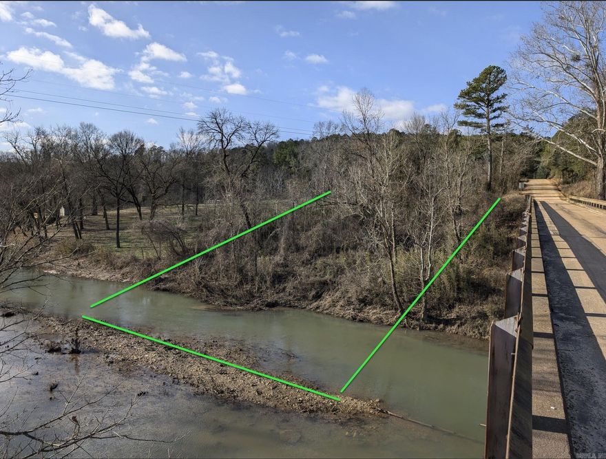 Just in time for April Eclipse opportunities -  Piney Creek frontage lot.   country rd and the prettiest bridge around gently slopes to sunny gravel bar that wading fisherfolk and kayakers crave and no more exist downstream.  Just about the last take out prior arriving the White River.  Creek is a jewel with a sand like (silica) bottom.  Runs year round. Trout and small mouth bass fishing.   Can float from here all the way to Mtn View and beyond.    Lot is unimproved - but major excavating not seemingly needed.  deed restrictions in place that do not preclude commercial activity.   Fiber optic internet, phone and electricity crosses lot.  septic needed.
