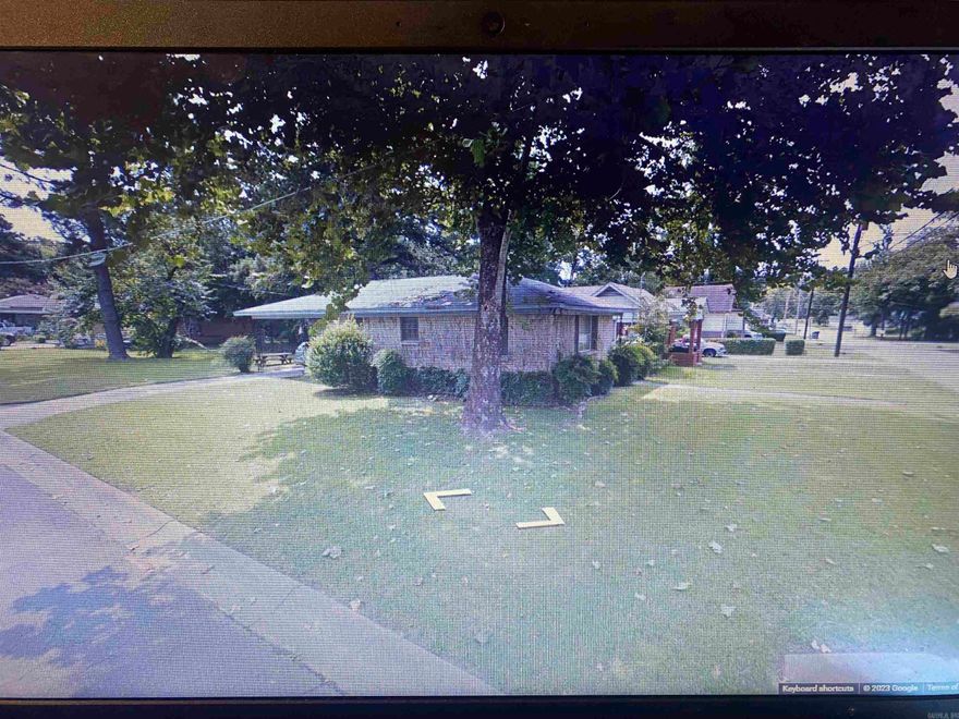 Cozy home on a large corner lot! Original hardwoods! New HVAC and HWH! Good storage throughout, carport, and natural light!