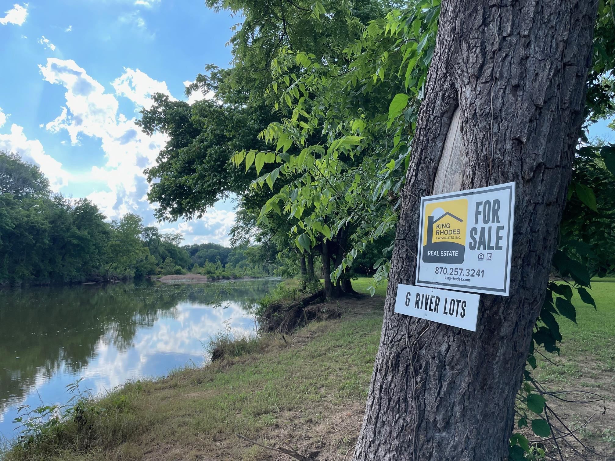 The perfect lot on the river to gather, camp and have some river fun! Elevated just a bit, but still right on the water this lot offers the best of all worlds. Put in up river and take out at your lot. 6 lots available in this area, prices starting at $29,900. Utilities near by. Call to see today!