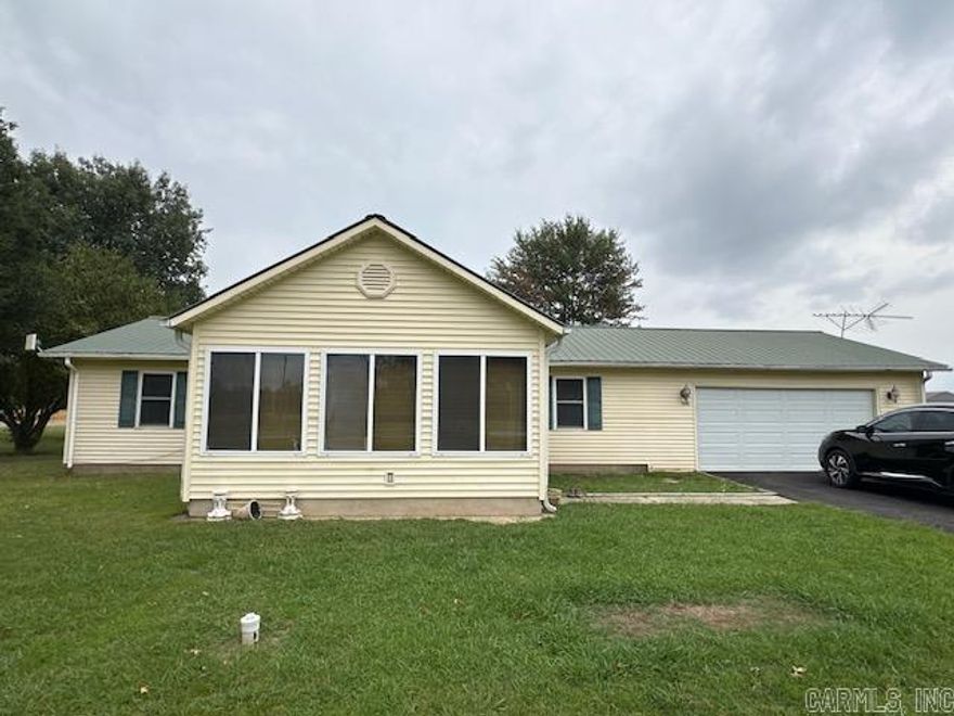 Welcome to your new home! This 3-bed, 2-bath house located in Oak Grove sits on a 1.40 acre corner lot with a large yard that is great for all sorts of activities! This home has a large sunroom, attached 2 car garage, paved driveway, and much more! This home is ready for your personal touch! Call/text listing agent Brandon Glenn at 870-530-5010 to schedule a showing today!