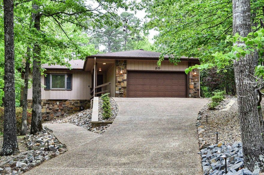 Create new memories here....Immaculately maintained 3 bedroom 3 bath home located across from Lake Segovia. This beautiful home offers a bath with each bedroom, bonus den or additional dining area plus a sun room. You have inside access to the 3rd bedroom and bath as well as a large sealed workshop/ storage area. The kitchen hosts an eat in area, separate laundry room with utility sink with multiple skylights throughout the home.Large floored attic storage area. Bennett Brothers landscaping/stonework complete this pretty picture. Hot Springs Village Property Owner Association has a new member buy-in fee of $2,000.00 due and collected at closing.