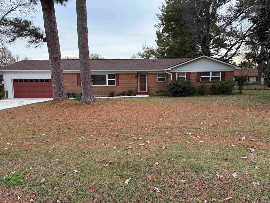 Brick home located in the heart of Nashville with in walking distance to the city park.  Home offers approx. 1,860 sq ft of living space, 3 bedrooms and 2 full baths.  Home is move in ready with New furnace and HVAC system in 2022, New Roof and bathroom remodel in 2023, New siding, gutters and guards and new bay window in 2024, new concrete driveway and sidewalk and new tankless gas hot water heater in 2025.  This home has a spacious living room, kitchen includes: electric stove top, wall oven, refrigerator and dishwasher, lots of cabinet space, dining/den area with fireplace w/gas insert.  Both bathrooms are updated, tile and laminate flooring through out the home.  Double garage, outside storage/laundry including washer and dryer, covered patio, fully fenced backyard and storage building.  This home is a must see, contact our office for more details or to schedule a viewing.